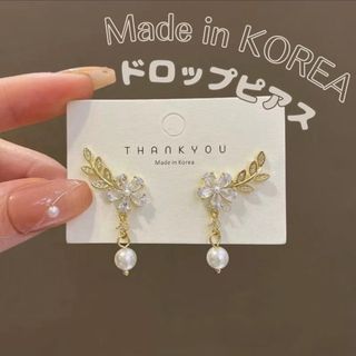 ピアス ゴールド フープピアス ストーン キラキラ ハート 韓国(ピアス)