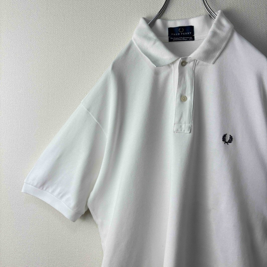 FRED PERRY(フレッドペリー)の人気　フレッドペリー　ポロシャツ　半袖　白　O ビンテージ　ホワイト　XL 古着 メンズのトップス(ポロシャツ)の商品写真