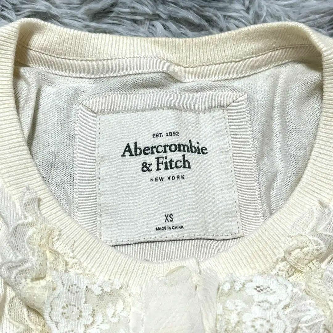 Abercrombie&Fitch(アバクロンビーアンドフィッチ)のアバクロンビー＆フィッチ　カーディガン　フリル　長袖　袖口リブ　裾リブ レディースのトップス(カーディガン)の商品写真