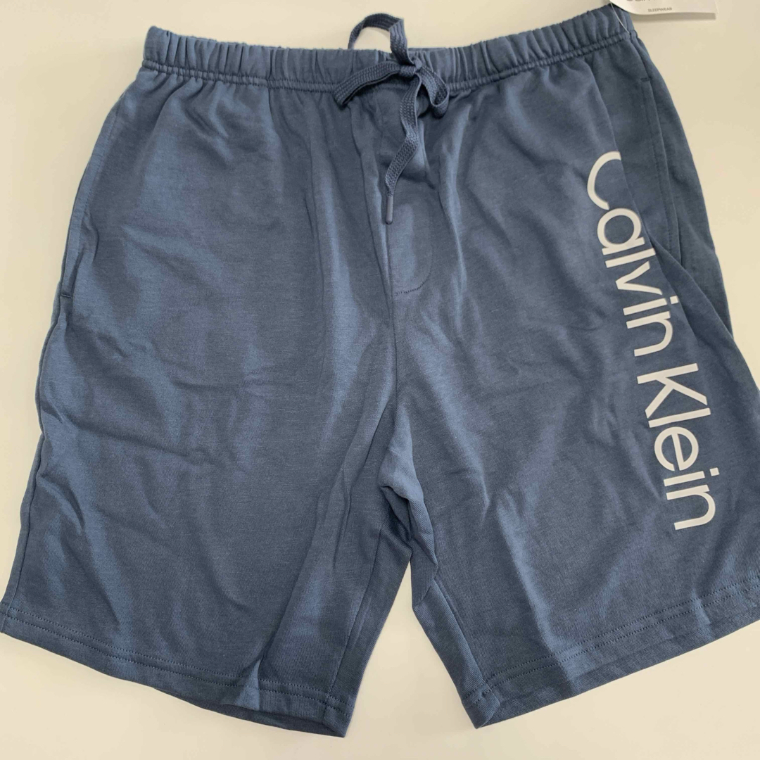 Calvin Klein(カルバンクライン)の【新品】カルバンクライン Tシャツ ハーフパンツ セットアップ ロゴブルー L メンズのトップス(Tシャツ/カットソー(半袖/袖なし))の商品写真