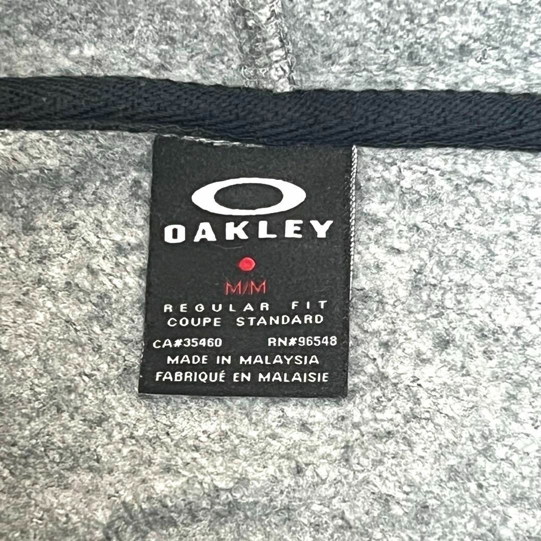 Oakley(オークリー)のレア古着 プルオーバー スカルライン グレー メンズL プリントロゴ スウェット メンズのトップス(スウェット)の商品写真