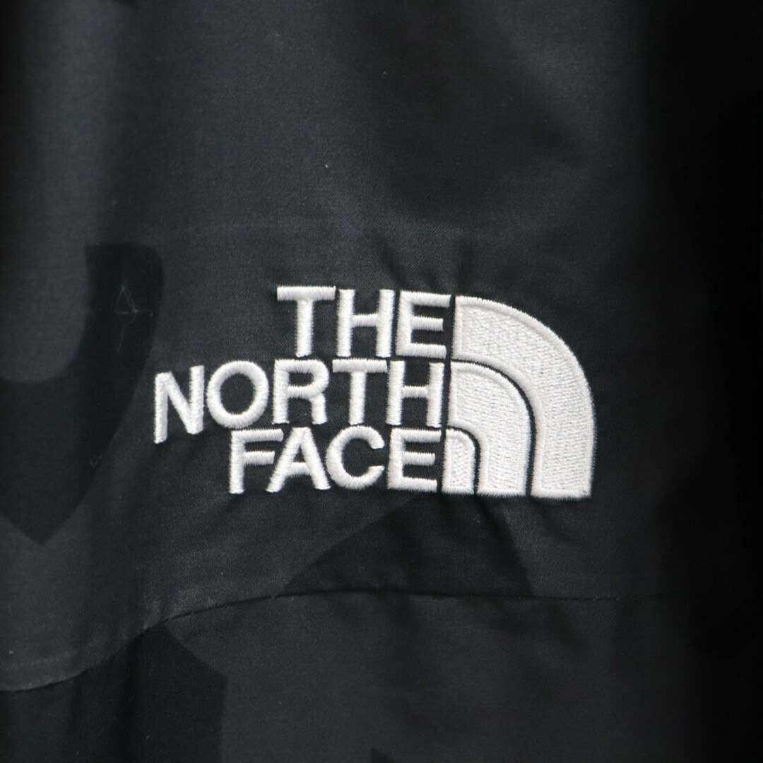 THE NORTH FACE(ザノースフェイス)のTHE NORTH FACE ザノースフェイス 22AW×KAWS 1986 Mountain Jacket NF0A7WLW カウズ マウンテンジャケット 総柄ナイロンジャケット ブラック メンズのジャケット/アウター(マウンテンパーカー)の商品写真