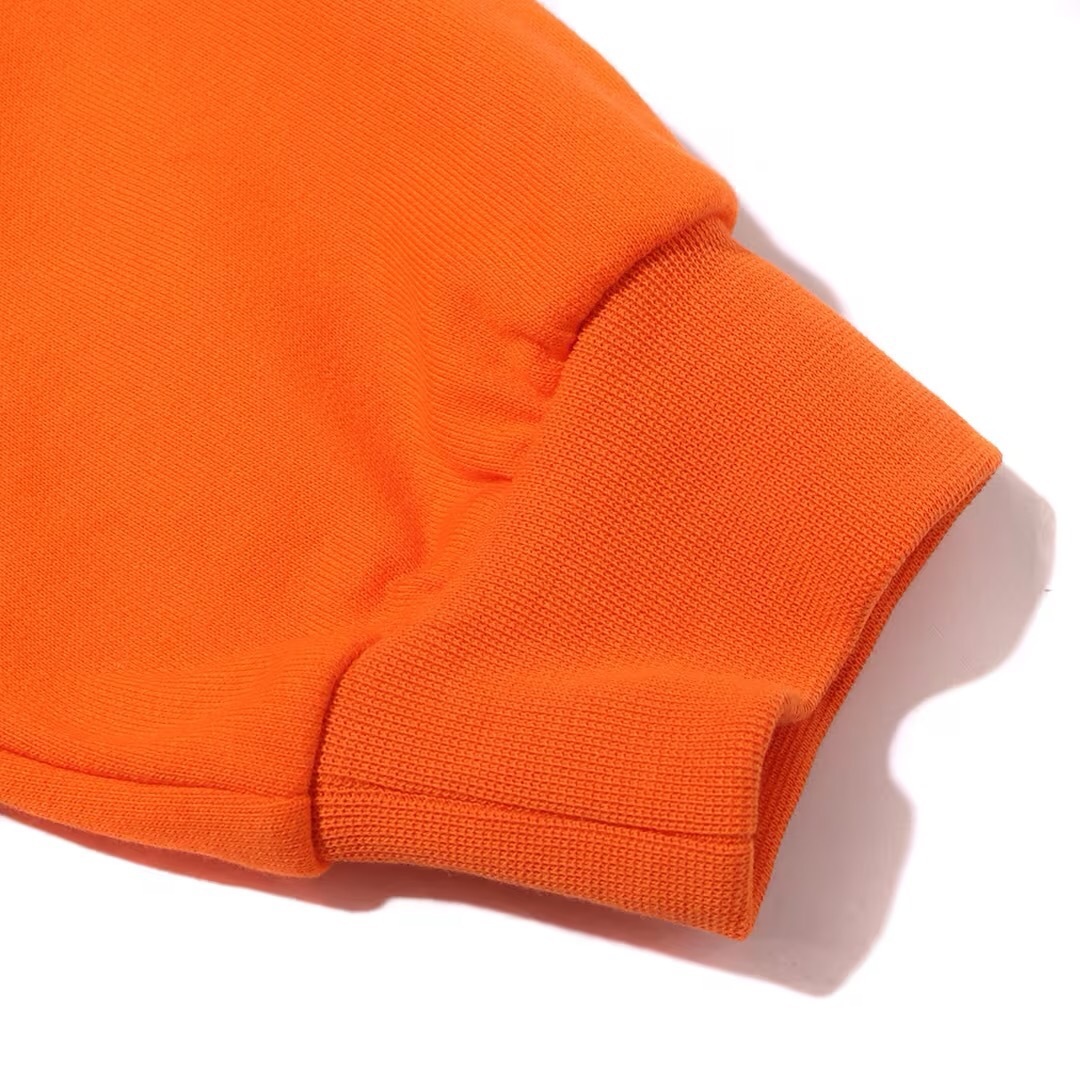adidas(アディダス)の【新品・未使用】アディダスパーカー　オレンジ メンズのトップス(パーカー)の商品写真