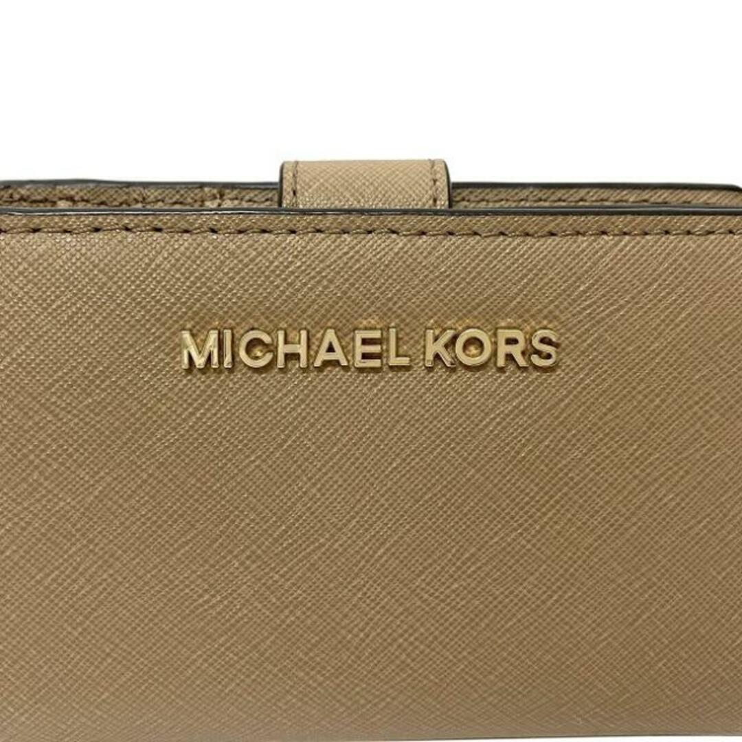 Michael Kors(マイケルコース)のマイケルコース 二つ折り 財布 ベージュ ブラウン 35F7GTVF2L 美品 レザー 中古 MICHAEL KORS 茶色 コンパクト ホック L字 ファスナー シンプル ロゴ ゴールド金具 ワンポイント 無地 定番 人気 レディース レディースのファッション小物(財布)の商品写真