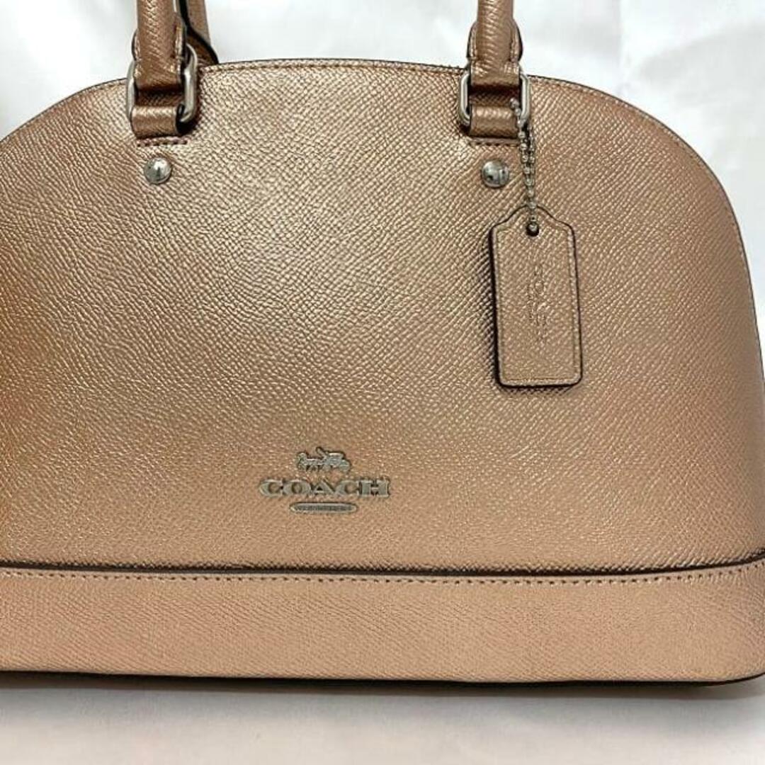 COACH(コーチ)のコーチ 2way バッグ ピンクゴールド メタリック F29170 ミニ シエラ サッチェル レザー 中古 COACH 美品 ハンドバッグ ショルダーバッグ グレインレザー ファスナー シンプル ワンポイント 定番 人気 女性 レディースのバッグ(ショルダーバッグ)の商品写真