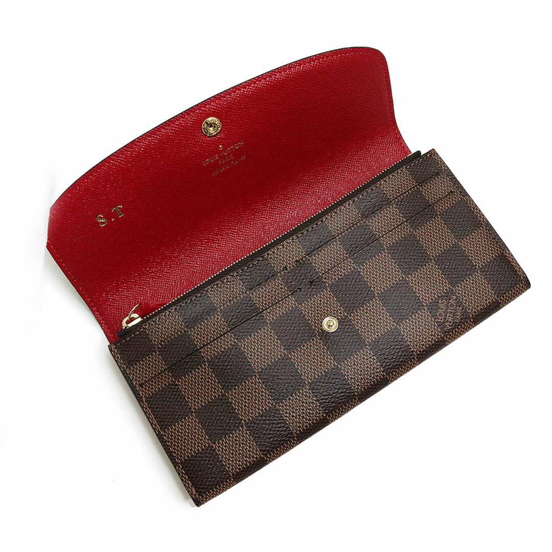 LOUIS VUITTON(ルイヴィトン)のルイ ヴィトン ポルトフォイユ エミリー 二つ折り長財布 ダミエ ブラウン ルージュ レッド 茶 赤 ゴールド金具 N63544 イニシャル入り 箱付 LOUIS VUITTON（新品同様品） レディースのファッション小物(財布)の商品写真