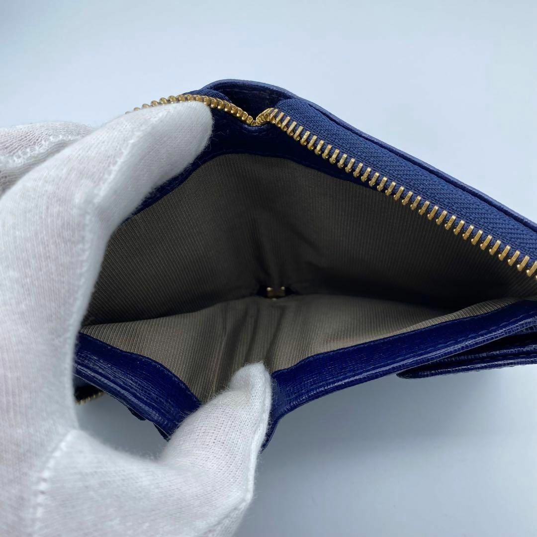 Furla(フルラ)のフルラ　レザー　二つ折り財布　ネイビー系　ゴールド金具 レディースのファッション小物(財布)の商品写真
