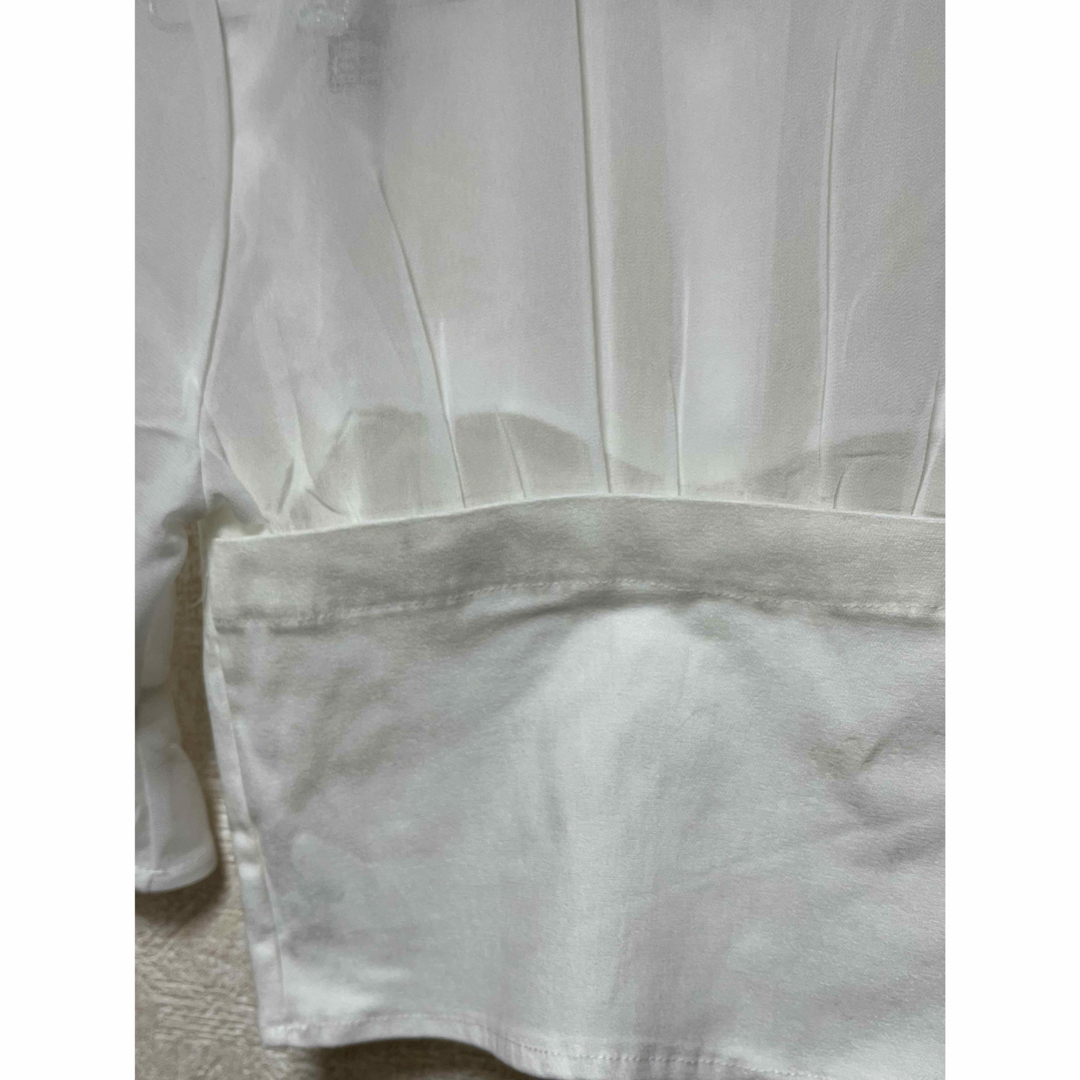 SPIGA(スピーガ)の美品SPIGAスピーガ　レースアップビスチェドッキングシアーブラウス　白 レディースのトップス(シャツ/ブラウス(半袖/袖なし))の商品写真