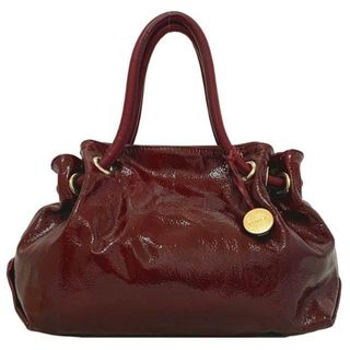 フルラ(Furla)のフルラ ハンドバッグ ワインレッド エナメル 巾着 パテント レザー 中古 FURLA 赤 シンプル チャーム付 マグネット トップハンドル 定番 人気 シンプル レディース 女性 鞄 マチ有 ゴールド金具 ソフトレザー お洒落 上品(ハンドバッグ)