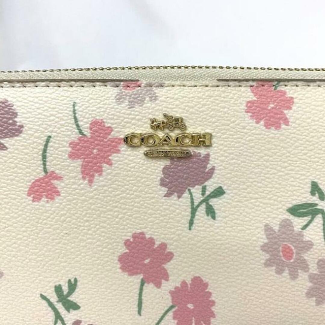 COACH(コーチ)のコーチ ラウンド ファスナー 長財布 ホワイト マルチカラー F1680 財布 PVC 中古 COACH 花柄 ロゴ 総柄 プリント 定番 人気 女性 レディース フラワー 花 ウォレット 可愛い ワンポイント 高級感 上品 エレガンス レディースのファッション小物(財布)の商品写真