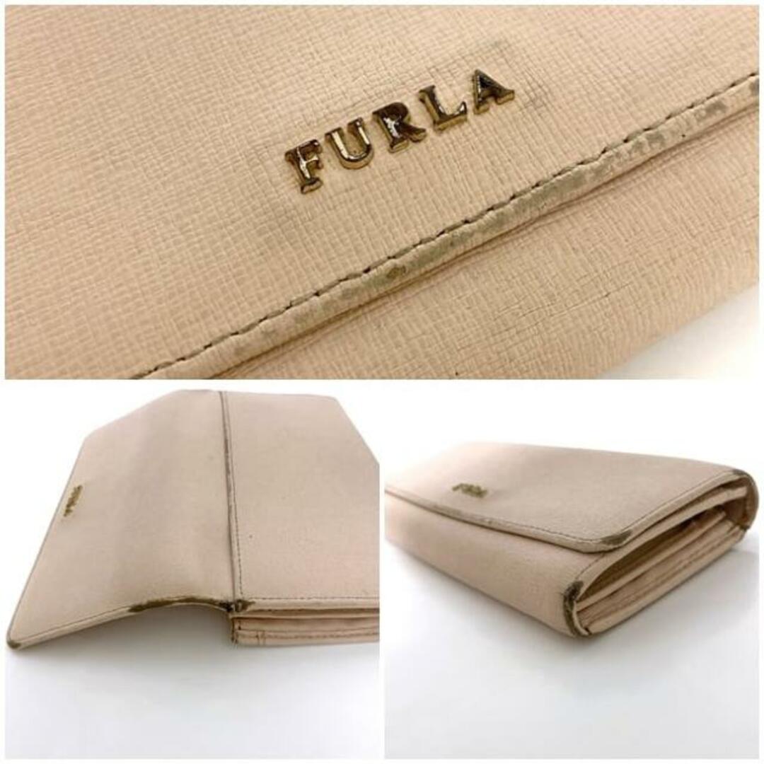 Furla(フルラ)のフルラ 二つ折り 長財布 ピンク ゴールド 財布 レザー 中古 FURLA ホック シンプル フラップ 定番 人気 女性 レディース 高級感 上品 エレガンス お洒落 淡い 無地 ロゴ ワンポイント ウォレット 可愛い 小銭入れ有 レディースのファッション小物(財布)の商品写真