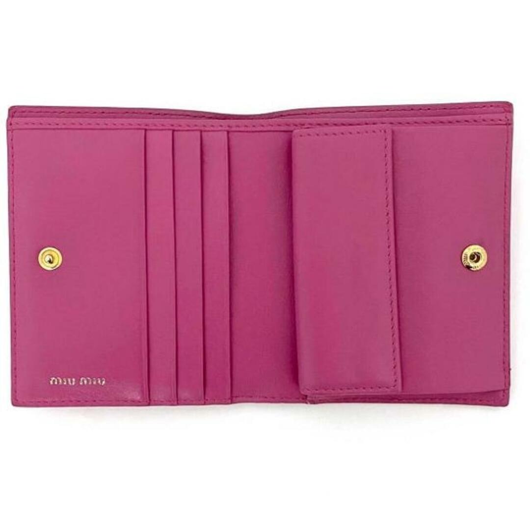MIU MIU - ミュウミュウ 二つ折り 財布 ピンク ホワイト MIU MIU - ミュウミュウ 二つ折り 財布 ピンク ホワイト