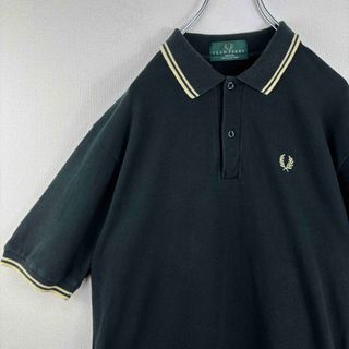 フレッドペリー(FRED PERRY)のフレッドペリー　ビンテージ　ポロシャツ　半袖　M12 黒金　M 古着(ポロシャツ)