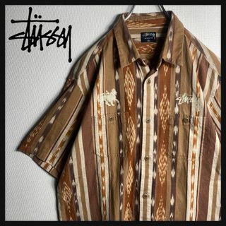 ステューシー(STUSSY)の【希少XLサイズ】ステューシー　ワンポイントロゴ　半袖シャツ　エスニック　総柄(シャツ)