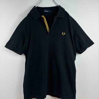 フレッドペリー(FRED PERRY)の大人気　フレッドペリー　ポロシャツ　半袖　ブラック　イエロー　M 古着(ポロシャツ)