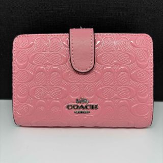 コーチ(COACH)のささちゃん様専用⭐︎コーチ　折財布　シグネチャー　ピンク　新品未使用(財布)