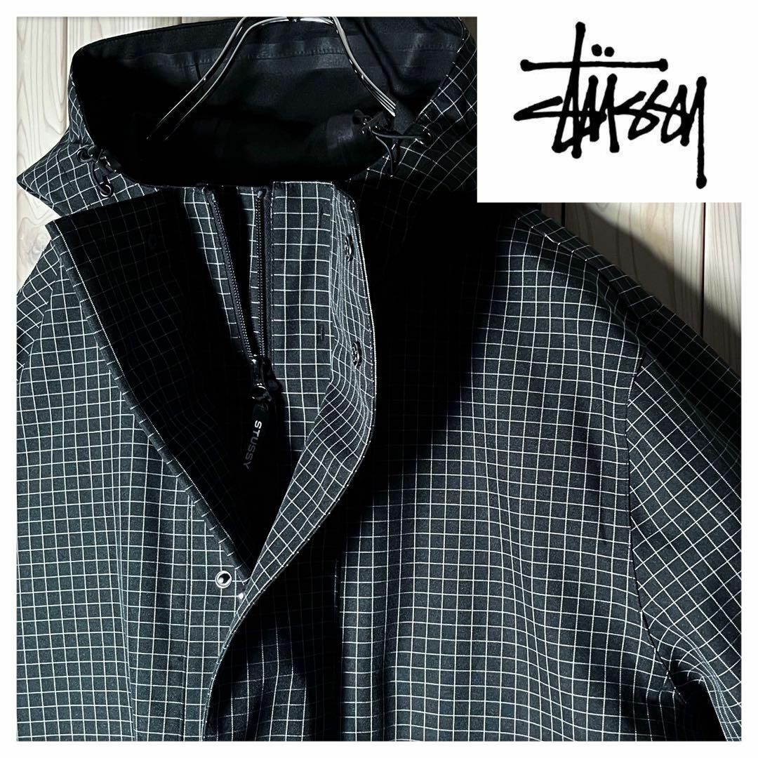 STUSSY(ステューシー)の【新品 XL】ステューシー 刺繍ロゴ 防水 ボンディング シェル パーカー 黒 メンズのジャケット/アウター(マウンテンパーカー)の商品写真