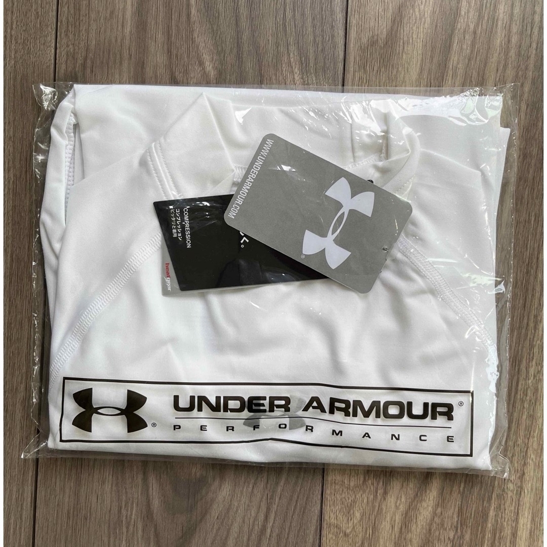 UNDER ARMOUR(アンダーアーマー)のアンダーアーマー　インナーシャツ　白　YLG 新品未使用 スポーツ/アウトドアの野球(ウェア)の商品写真