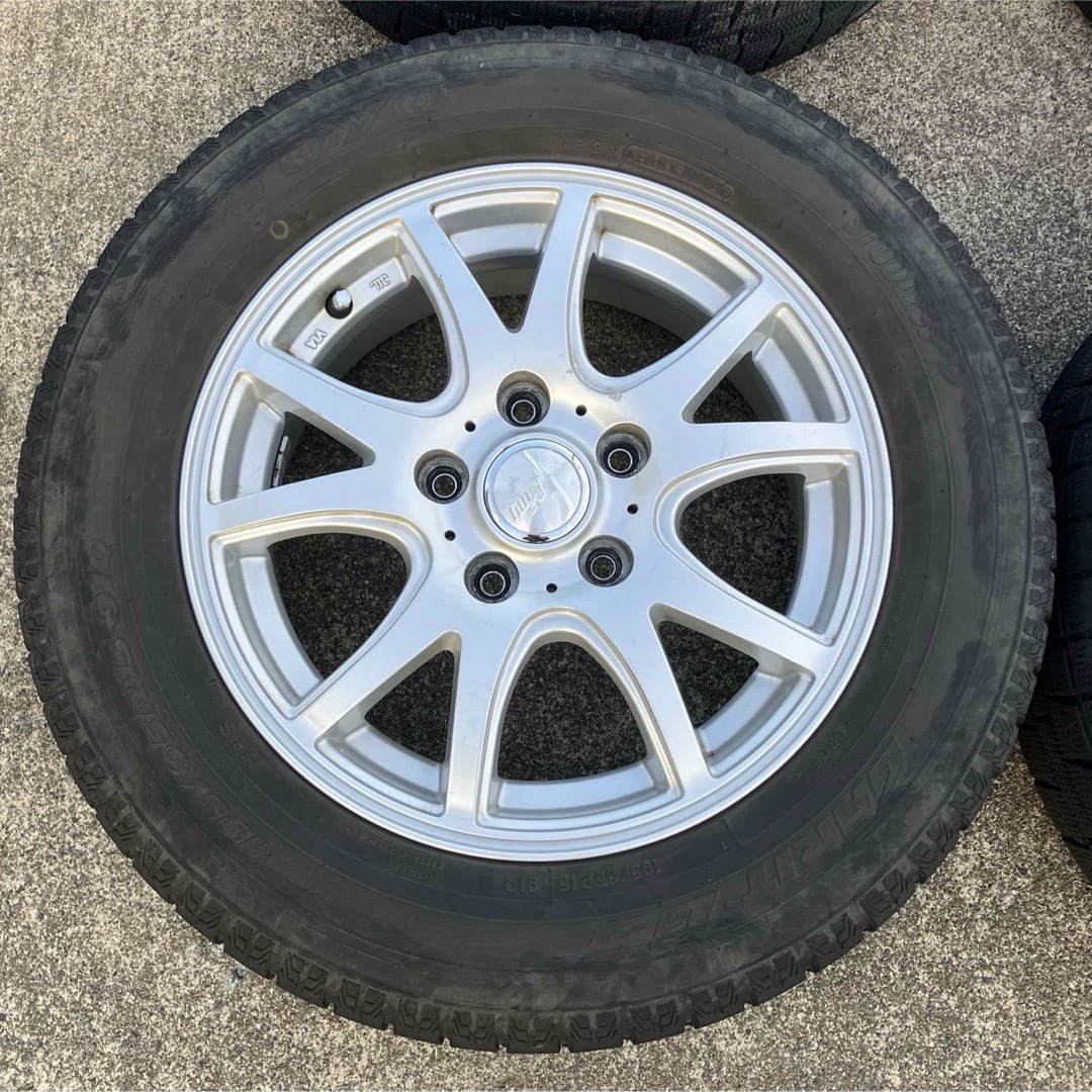 トーヨータイヤ(トーヨータイヤ)の195/65R15 スタッドレスタイヤ アルミホイール４本セット キャップナット 自動車/バイクの自動車(タイヤ・ホイールセット)の商品写真