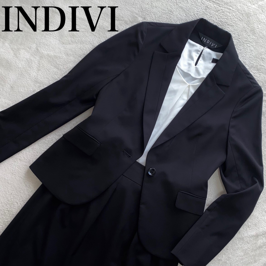 INDIVI(インディヴィ)のINDIVI 美品　上38下36 M位　ストレッチ生地で着心地◎ ブラックスーツ レディースのフォーマル/ドレス(スーツ)の商品写真