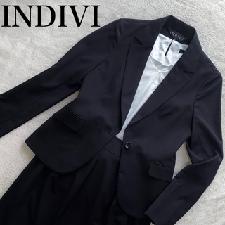 インディヴィ(INDIVI)のINDIVI 美品　上38下36 M位　ストレッチ生地で着心地◎ ブラックスーツ(スーツ)
