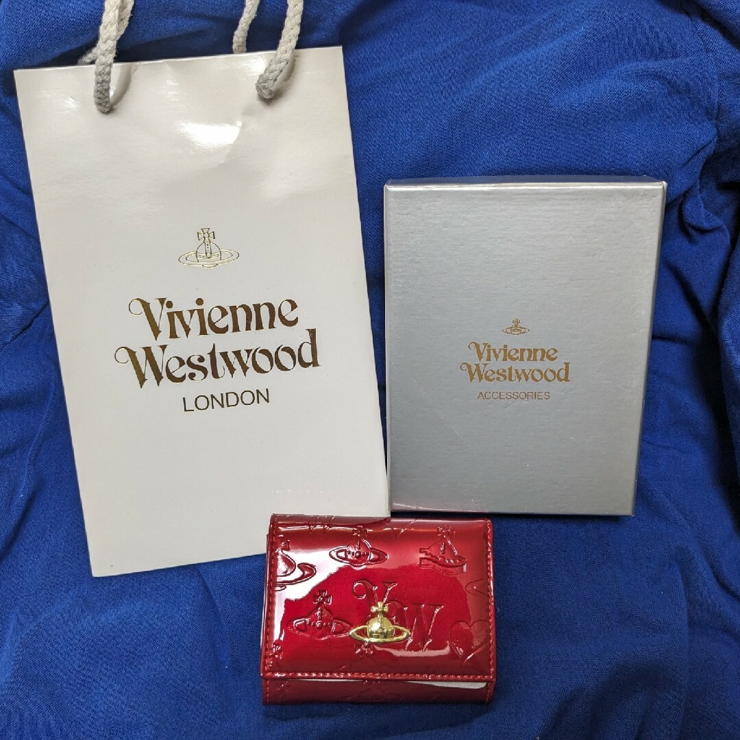 Vivienne Westwood(ヴィヴィアンウエストウッド)の【新品未使用】　ヴィヴィアンウエストウッド 三つ折財布　赤　エナメル　がま口 メンズのファッション小物(折り財布)の商品写真