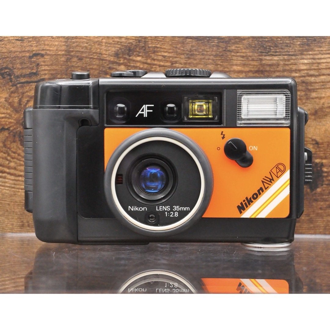 Nikon(ニコン)のフィルムカメラ　NIKON L35AWADオレンジ　防水カメラ　分解整備済み！ スマホ/家電/カメラのカメラ(フィルムカメラ)の商品写真