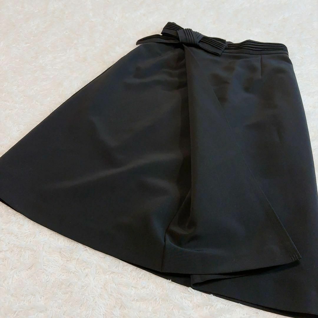 FOXEY NEW YORK(フォクシーニューヨーク)の美品✨フォクシーニューヨーク フレアスカート リボン 巻きスカート 38 黒 レディースのスカート(ひざ丈スカート)の商品写真