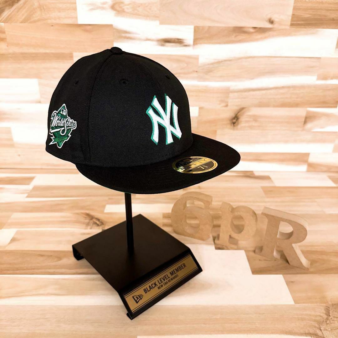 NEW ERA(ニューエラー)のレア【ニューエラ×ヤンキース】ワールドシリーズ1999パッチ キャップ 黒×緑 メンズの帽子(キャップ)の商品写真