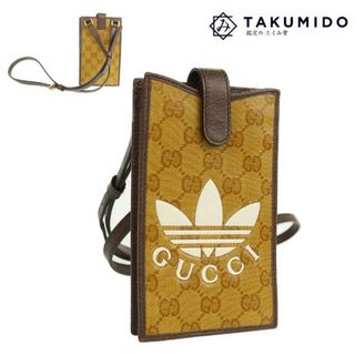 Gucci - グッチ ショルダーバッグ アディダス コラボ スマホポーチ 702203 中古 GGクリスタル ブラウン コーティングキャンバス GUCCI【中古】 | adidas ポシェット ユニセックス ブランド 斜め掛け ミニバック Aランク