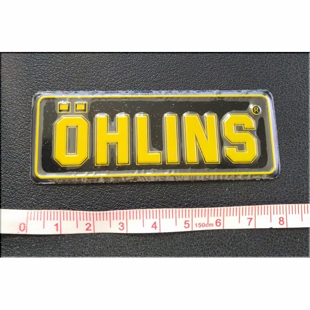 オーリンズ（OHLINS）★アルミ耐熱ステッカー★８×３ｃｍ★黒×黄 自動車/バイクのバイク(パーツ)の商品写真