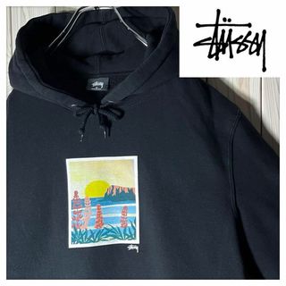 ステューシー(STUSSY)の【良品 M】ステューシー コースタル イラスト スウェット パーカー 黒(パーカー)