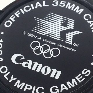 キヤノン(Canon)のCANON 希少品 ロサンゼルスオリンピック ビンテージ レンズキャップ 良品(フィルムカメラ)