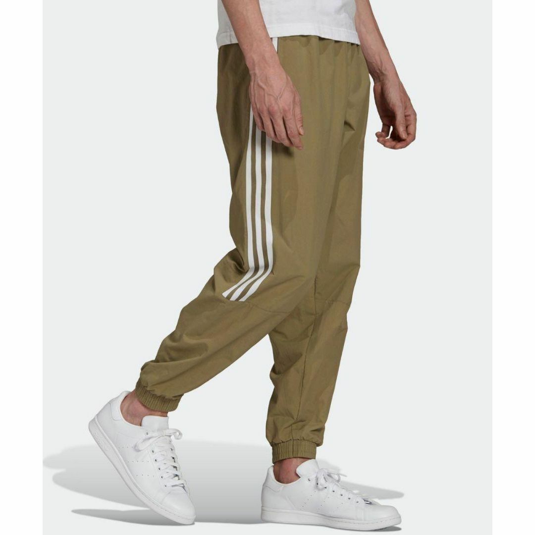 Originals（adidas）(オリジナルス)のアディダス 緑カーキ ウーブン ロックアップ トラックパンツ ジャージ 男性XS メンズのパンツ(その他)の商品写真