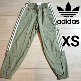 オリジナルス(Originals（adidas）)のアディダス 緑カーキ ウーブン ロックアップ トラックパンツ ジャージ 男性XS(その他)