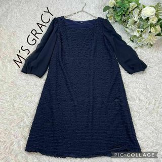 エムズグレイシー(M'S GRACY)の【美品】エムズグレイシー★フリルワンピース★シアー★ネイビー★サイズ38(ひざ丈ワンピース)