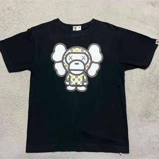 アベイシングエイプ(A BATHING APE)のAPE BAPE KAWS BABY MILO tシャツ　モノグラム　M 黒(Tシャツ/カットソー(半袖/袖なし))