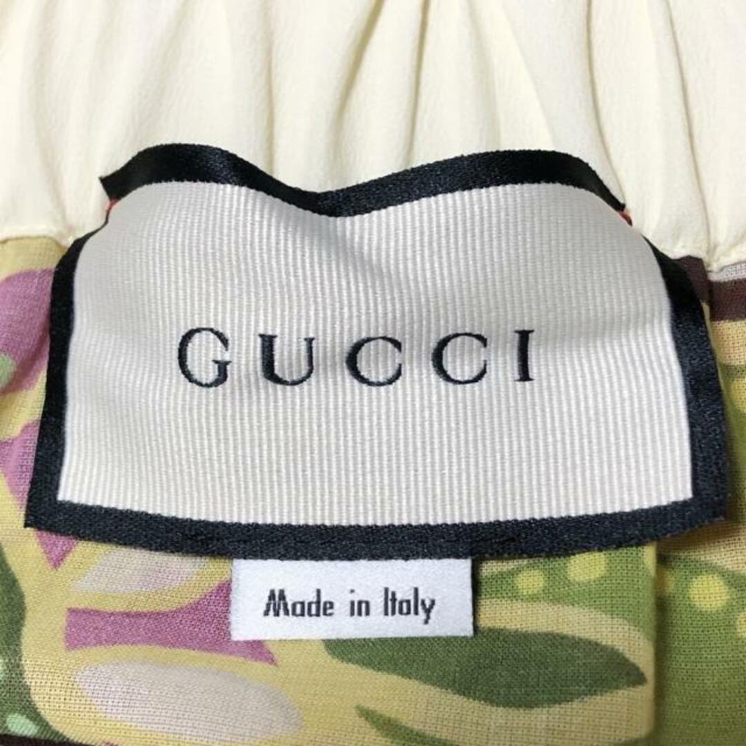 Gucci(グッチ)のGUCCI(グッチ) ロングスカート サイズ38 S レディース美品  - 586028 ダークブラウン×オレンジ×マルチ 花柄/豹/ウエストゴム レディースのスカート(ロングスカート)の商品写真