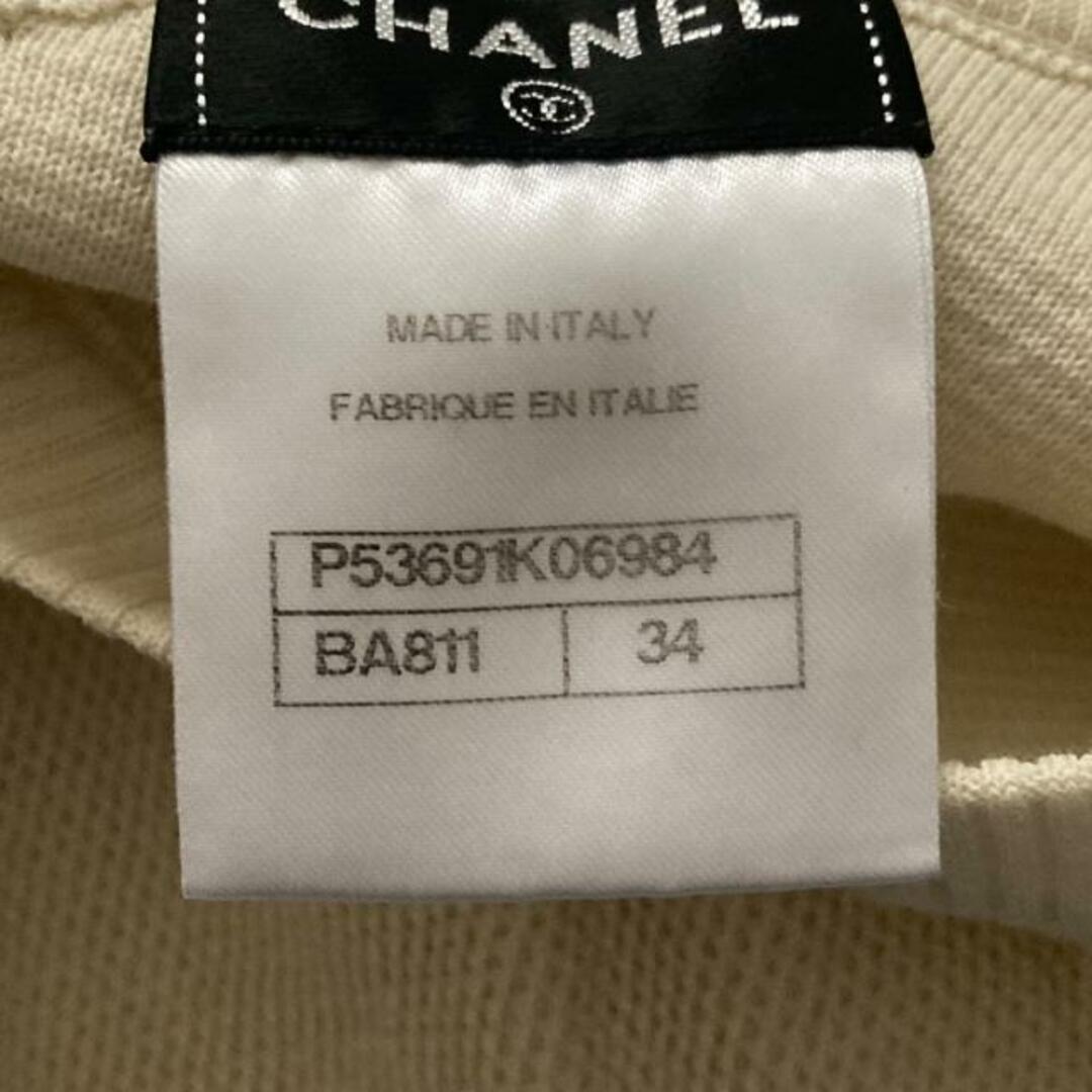 CHANEL(シャネル)のCHANEL(シャネル) スカートセットアップ レディース - P53691/P53671 アイボリー ココマーク/ニット/半袖 レディースのレディース その他(セット/コーデ)の商品写真