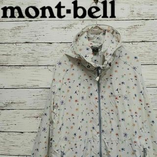 モンベル(mont bell)のmont-bell モンベル ウインドブラストプリントパーカ M キャンプ(ナイロンジャケット)