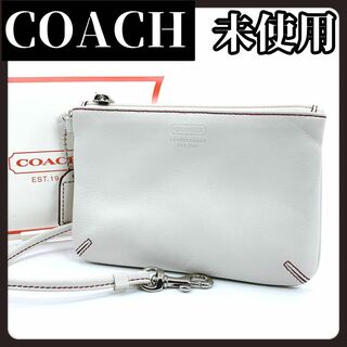COACH - 【箱付き未使用】COACH　コーチ　ホワイト　白　ポーチ　シグネチャー　化粧品