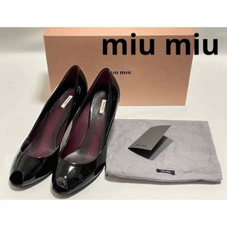 ミュウミュウ(miumiu)のほぼ未使用■miu miuミュウミュウ エナメル パンプス オープントゥ(ハイヒール/パンプス)