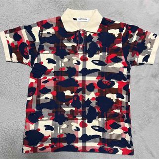 アベイシングエイプ(A BATHING APE)のAPE BAPE KAWS ラブジェネチェック　ポロシャツ　tシャツ　CAMO(ポロシャツ)