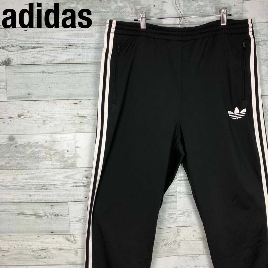 adidas(アディダス)のアディダスオリジナルス ファイアーバード 刺繍ロゴ トラックパンツ ジャージ メンズのパンツ(その他)の商品写真