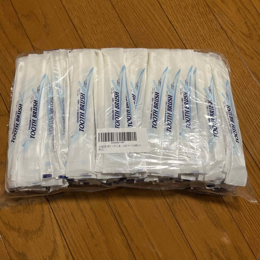 日本製　使い捨てハブラシ　100本入り　歯磨き付き（キシリトール） コスメ/美容のオーラルケア(歯ブラシ/デンタルフロス)の商品写真