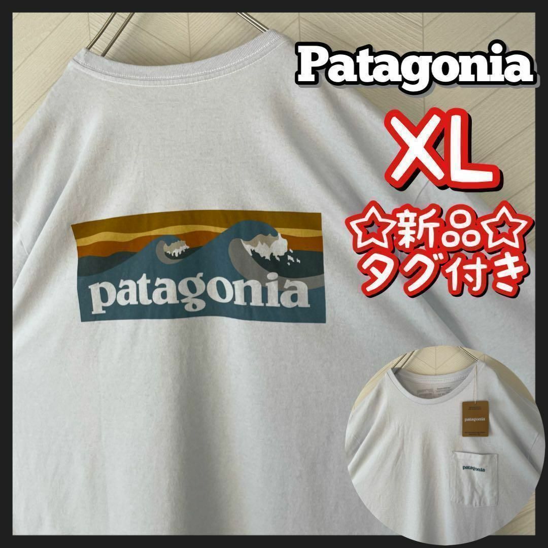 patagonia(パタゴニア)の激レア 新品 Patagonia パタゴニア Tシャツ 波 ポケT 白 XL半袖 メンズのトップス(Tシャツ/カットソー(半袖/袖なし))の商品写真