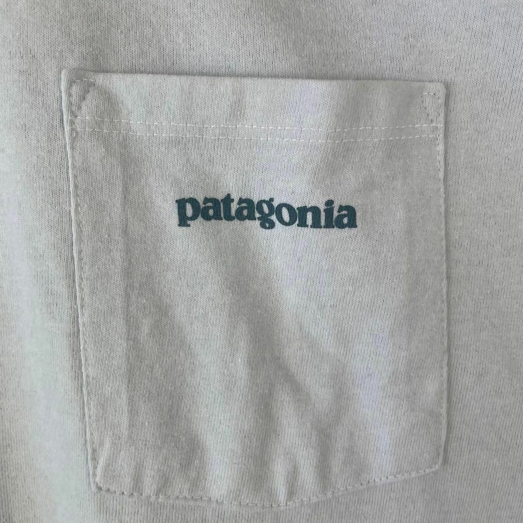 patagonia(パタゴニア)の激レア 新品 Patagonia パタゴニア Tシャツ 波 ポケT 白 XL半袖 メンズのトップス(Tシャツ/カットソー(半袖/袖なし))の商品写真