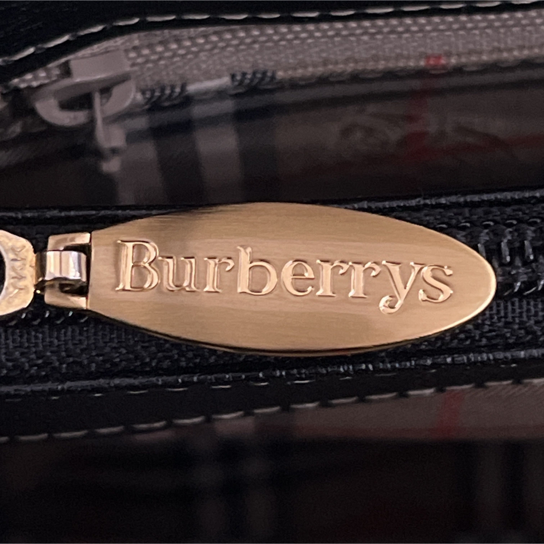 BURBERRY(バーバリー)のバーバリー　トートバッグ　ノバチェック　ロゴプレート　ゴールド金具　ブラック　革 レディースのバッグ(トートバッグ)の商品写真