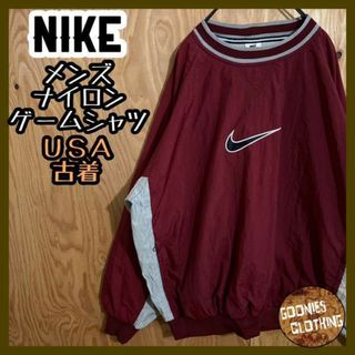 ナイキ(NIKE)のナイキ スウッシュ USA古着 90s 白タグ ゲームシャツ ナイロン ボルドー(ナイロンジャケット)