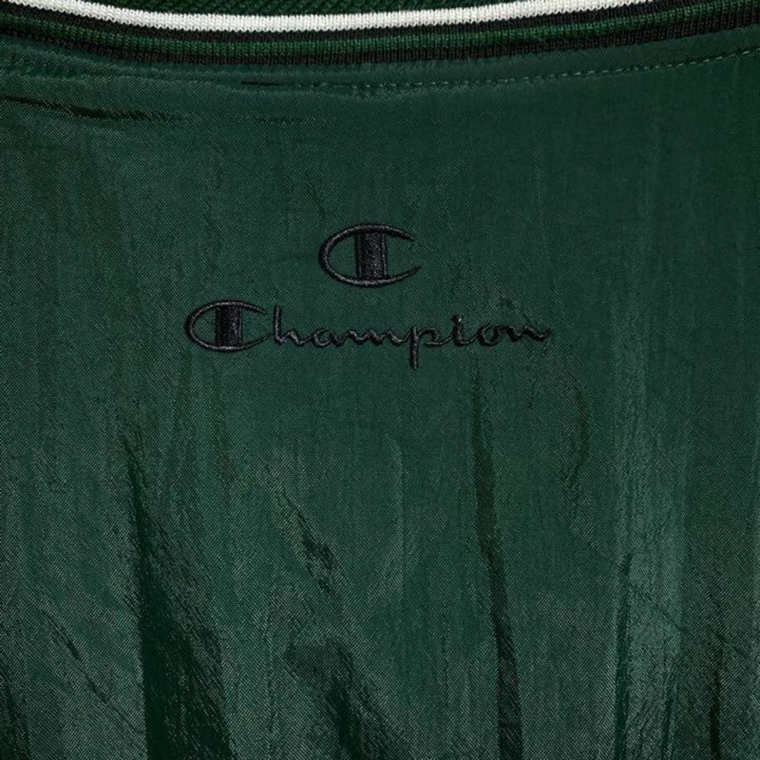 Champion(チャンピオン)のチャンピオン Vネック ナイロン チームロゴ 2XL 緑 古着 長袖 アウター メンズのジャケット/アウター(ナイロンジャケット)の商品写真